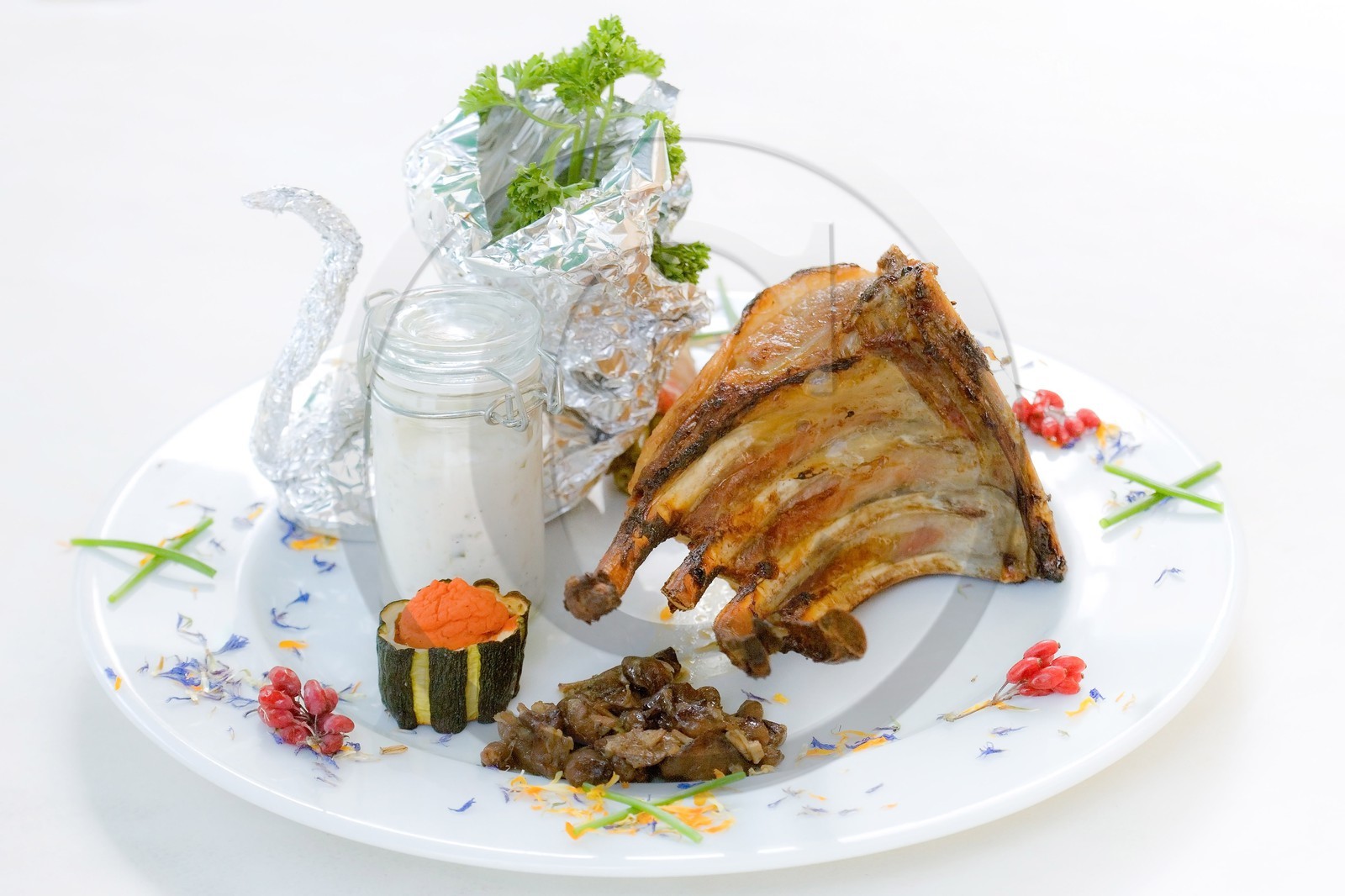 Côtelettes d'agneau flambées à la liqueur de mélèze